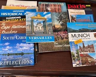 Group of books including travel maps and books for Munich, Vienna, South Carolina