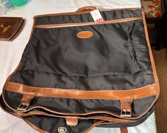 Vintage black canvas and leather suit bag, some wear