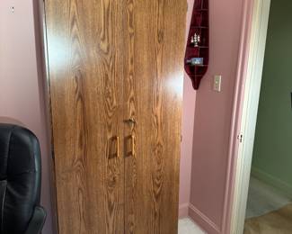 Laminate 2-door storage cabinet with some adjustable shelves 6'2"H x 30"W x 18"D