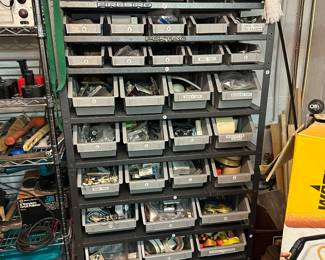 Rack & bins not for sale. Contents are for sale.