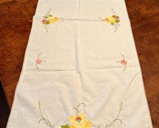 There is nice selection of vintage linens and textiles