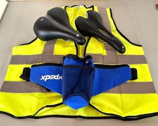 Biking accessories including a Like New Lithia 143 specialized GEL saddle