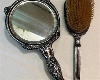 Antique sterling silver mirror and sterling silver hairbrush 