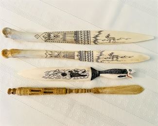 Vintage and antique carved bone letter openers including one by Leo Kunnuk