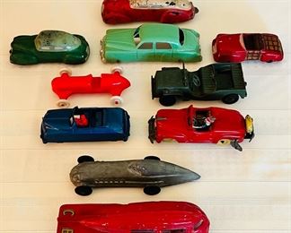 Vintage toy cars by M&L, Acme, Sun Rubber Co. and more