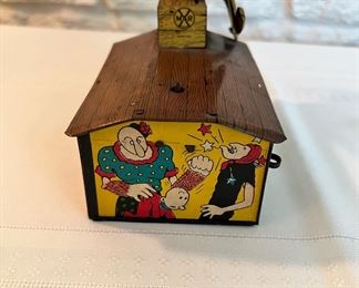 Vintage Marx tin litho Popeye & Olive Oyl on Roof.  As shown in the photos, Popeye is missing his arms and the original stem he would be attached to