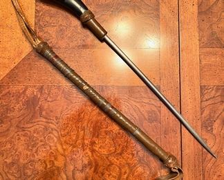 Gentleman’s riding crop with ebony wood animal face handle on a hidden “spear”.