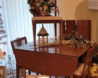 Vintage drop leaf table (with three leaves) and four chairs