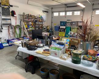 Packed Garage in Addition to 600+ Sq. Ft. Workshop!