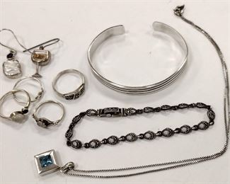 STERLING JEWELRY:     BRACELET SET WITH MARCASITES ,  UNMARKED SMALL CUFF BRACELET,   FOUR SMALL RINGS WITH STONES, 
TWO SINGLE EARRINGS,   SQUARE PENDANT WITH CHAIN HAVING BLUE TOPAZ COLOR STONE,