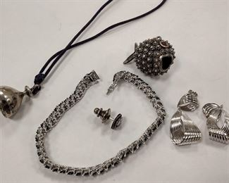 UNMARKED STERLING  PUFFER FISH PENDANT,
 A BELL PENDANT, PAIR OF STAMPED EARRINGS
AN INLAID SOUTHWEST TIE TACK
 AND TENNIS BRACELET

TOTAL WEIGHT EXCLUDING THE STRING AND TIE TACK 44.3 GRAMS
