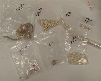 STERLING SILVER WIRE AND BEADS FOR MAKING JEWELRY.  ALSO INCLUDES A TURQUOISE CLASP.  TOTAL WEIGHT IS SOMEWHERE OVER 231.8 GRAMS OR 7.45 TROY OUNCES. ITEMS ARE NOT MARKED BUT HAVE BEEN TESTED