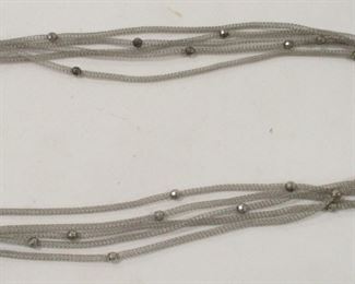 AN ITALIAN MULTI STRAND STERLING SILVER MESH  NECKLACE.  19" LONG.  9.5 GRAMS