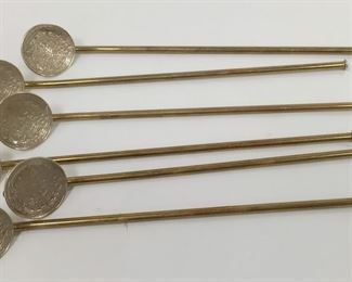 A VINTAGE SET OF SIX MEXICAN PLATED ICE TEA SPOONS/STRAWS.  EACH WITH GOLD TONE STEMS AND AZTEC CALENDAR THEME  BOWLS.  7.75" LONG
