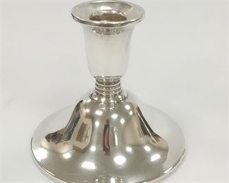 A GUNDERSON STERLING WEIGHTED REINFORCED CANDLE HOLDER, NUMBERED 141 15.  CLEAN CONDITION EXCEPT FOR SMALL DENTS ON UPPER RIM.  3.75" TALL.  155.0 GRAMS OR 4.98 TROY OUNCES 
