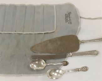 REED & BARTON STERLING BABY SPOON.  7 3/8" LONG,  CAKE SPATULA WITH HAMMERED STERLING SILVER HANDLE,  TABLE KNIFE WITH SILVER PLATED HANDLE, MONOGRAMMED H.H.J.JR,  A DAMAGED LUNT STERLING BABY SPOON. EDGES OF BOWL DENTED,  MAHNCKE & CO FELT SILVER BAG, TACOMA WASH. PIONEER JEWELERS

WEIGHT OF THE TWO SPOONS 1.45  TROY OUNCES

ESTIMATE $ 33.06