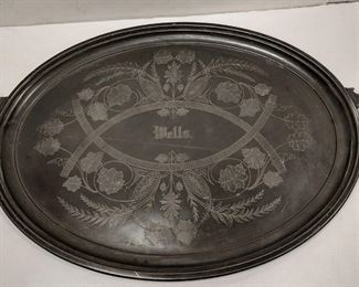 REED & BARTON AESTHETICS MOVEMENT PERIOD BUTLER'S TRAY. HAS ROMAN MEDALLIONS ON EACH HANDLE.  MEASURES 19.75" X 31.5" HANDLE TO HANDLE.  MONOGRAMMED 'WELLS'. PAT'D DEC 1867.  WEAR FROM USE.  SOMEONE PUT SOME SCRATCHES ON THE BACK SIDE OF THE RIM????