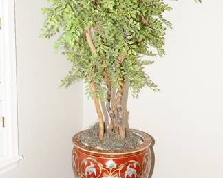 Faux tree in fish bowl planter on rosewood stand