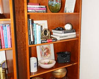 There are two cherry wood bookcases available