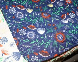 There are several very nice comforters, quilts, down filled comforters & linens available for sale