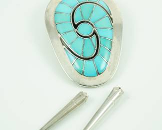 Dickie & Amy Quandelacy turquoise & sterling bolo tie.  There is also a matching belt buckle which includes a hand tooled inlaid turquoise leather belt. 