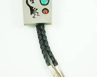 Turquoise, coral on sterling etched flute player bolo tie by Larry Tsinnie