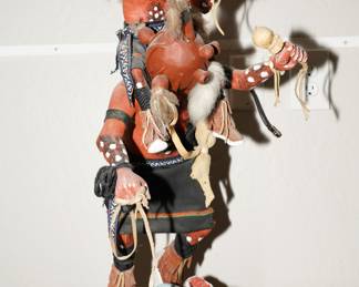 Watermelon mud man kachina carrying a kachina. This piece is missing a few watermelon and needs a bit of TLC and repair. 
