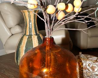 Amber glass globe vase with decor