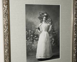 There are several antique framed photos available for sale. 