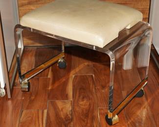 Leather topped lucite rolling vanity stool