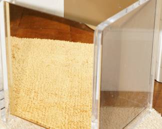 Mirrored lucite waste basket