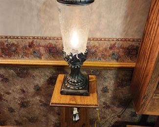 Small but tall table with a lamp