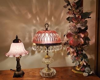 Cranberry lamps and flower arrangement 