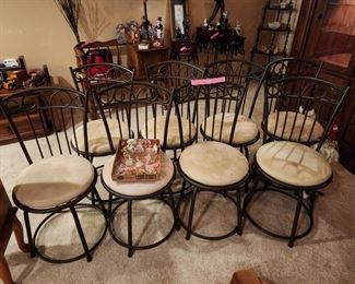 8 swivel chairs, each sold separately 