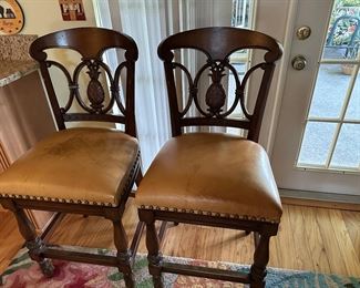 Two sturdy bar stools with leather seats