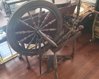 Country craftsman spinning wheel and matching stool