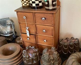 Antique molds and spice cabinet
