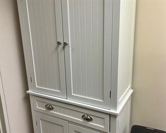 Beautiful, white tall, narrow cabinet