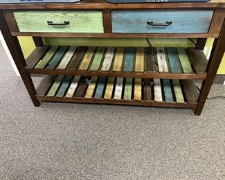 Distressed color table with two drawers, and two shelves