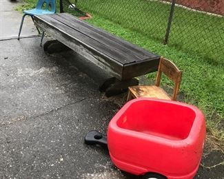 Chairs, wood bench and haul behind wagon