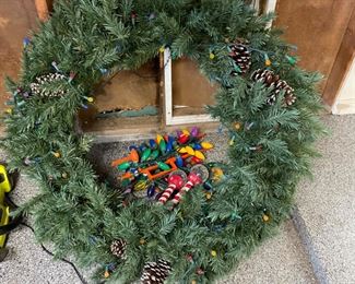 Outdoor Christmas wreath, along with many other Christmas decorations
