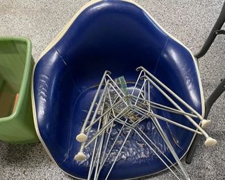 Two Eames armchairs. Hardware is included