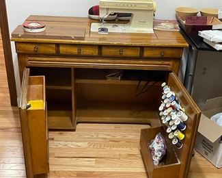 Sewing machine and cabinet