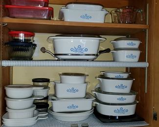 Blue corn flower corningware serving dishes most have lids