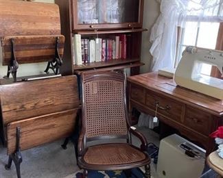 One of two barrister book cases, two old school desks, nice rocker.