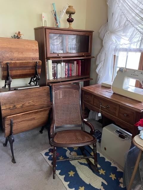 One of two barrister book cases, two old school desks, nice rocker.