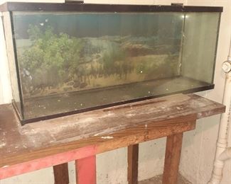 large aquarium  some supplies.  IN BASEMENT