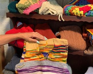 Knitted vest, hat and sweaters 