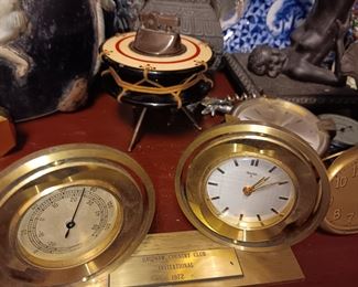 Small desk clocks, lighter