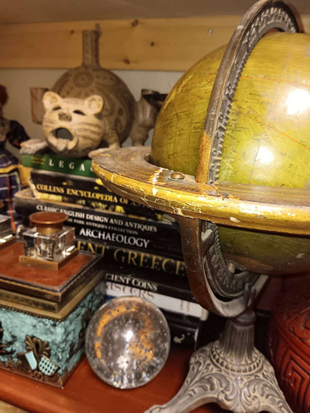 Antique globe, pottery cat